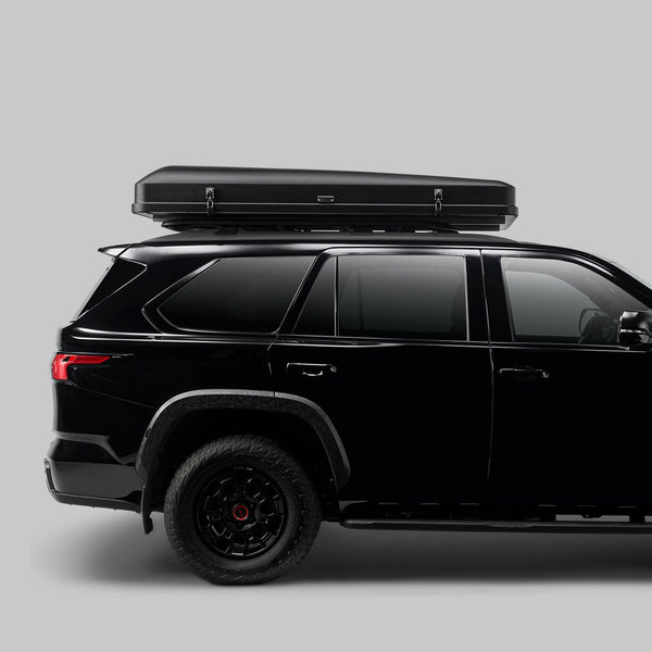 iKamper Skycamp 4.0 Quad closed, low-profile side view on a large SUV