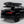 Load image into Gallery viewer, iKamper Skycamp 4.0 Quad closed on roof bars, rear three-quarter view
