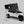 Load image into Gallery viewer, iKamper Skycamp 4.0 Trio open on an SUV roof with ladder deployed, front three-quarter view
