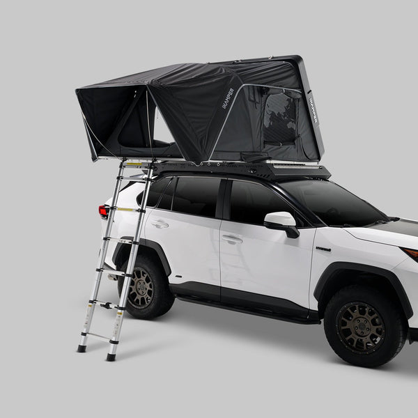 iKamper Skycamp 4.0 Trio open on an SUV roof with ladder deployed, front three-quarter view