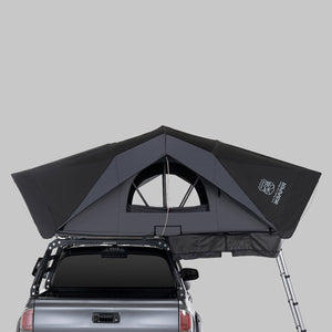 iKamper X-Cover 3.0 open on a ute, rear view showing the skyview windows