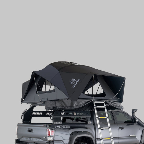 iKamper X-Cover 3.0 hybrid rooftop tent open on a ute bed rack with ladder
