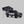 Load image into Gallery viewer, iKamper X-Cover 3.0 set up on a Toyota Tacoma, front three-quarter view
